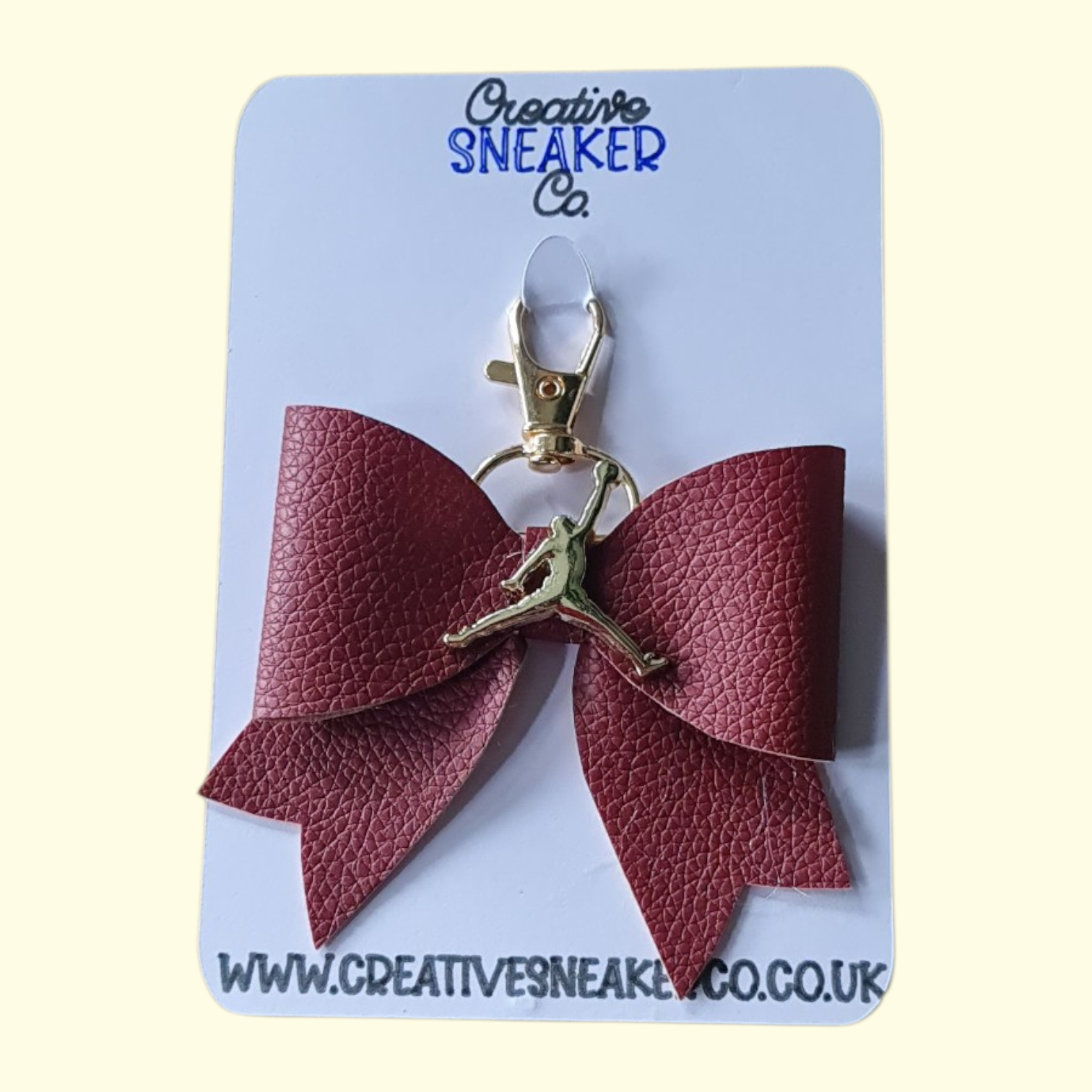 Wine Gold Jumpman Bag Charm