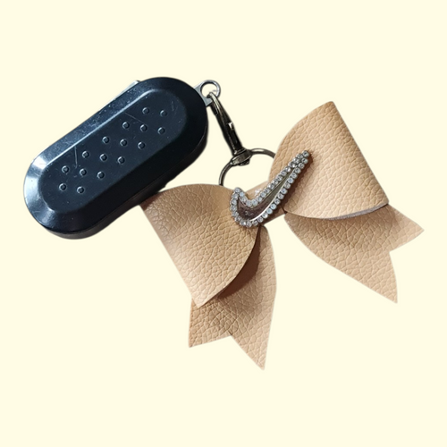 Beige Gold Swoosh Bag Charm