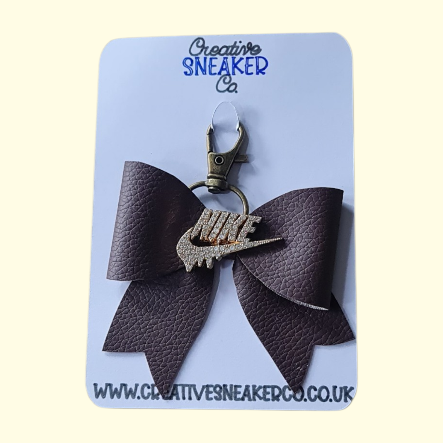 Brown Gold Nike Swoosh Bag Charm